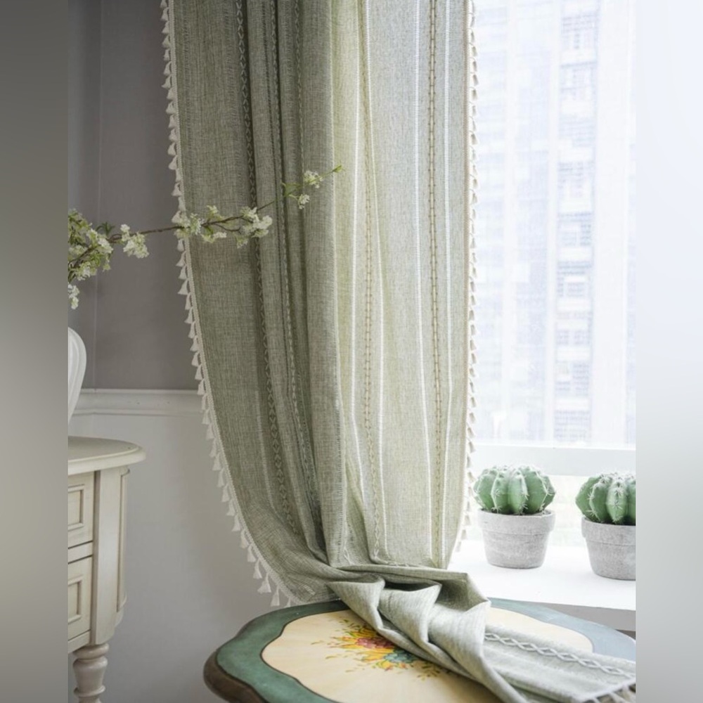 Elegant Green Curtain with Tassel Trim